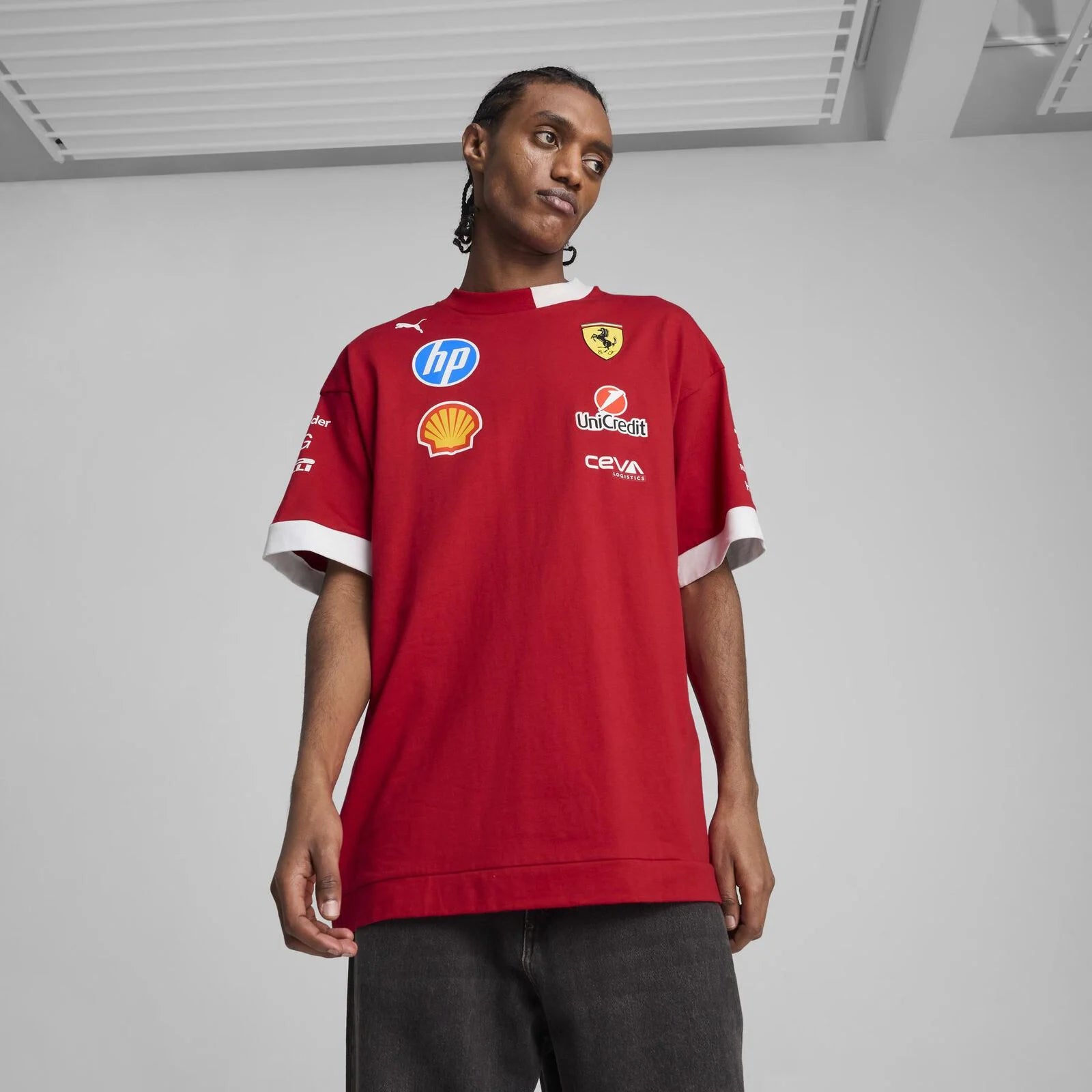 Model wearing 2025 Ferrari Oversized F1 T-Shirt (front view)