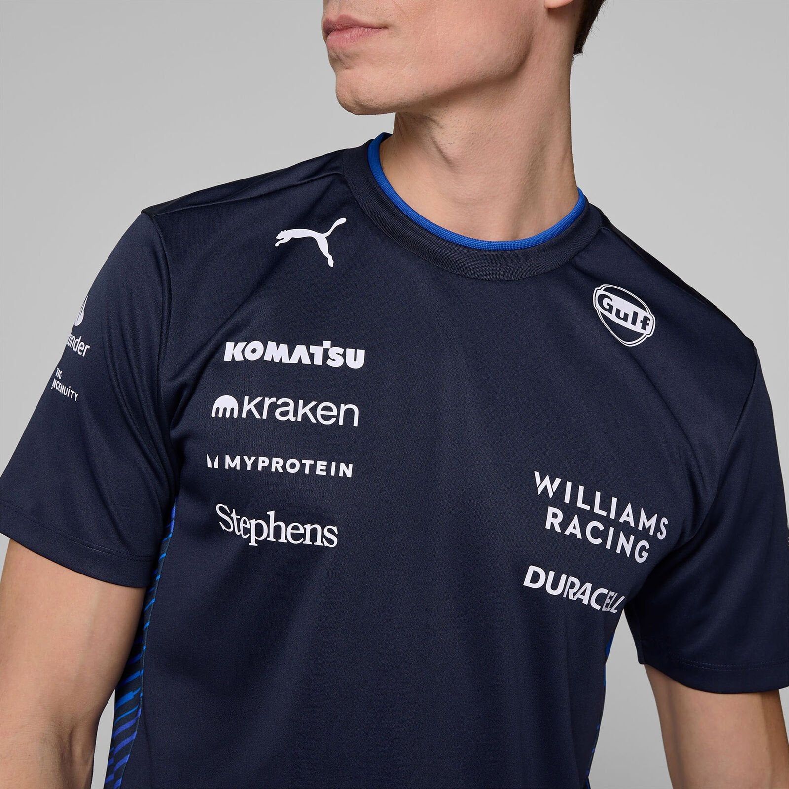 Close-up of team and sponsor logos on chest